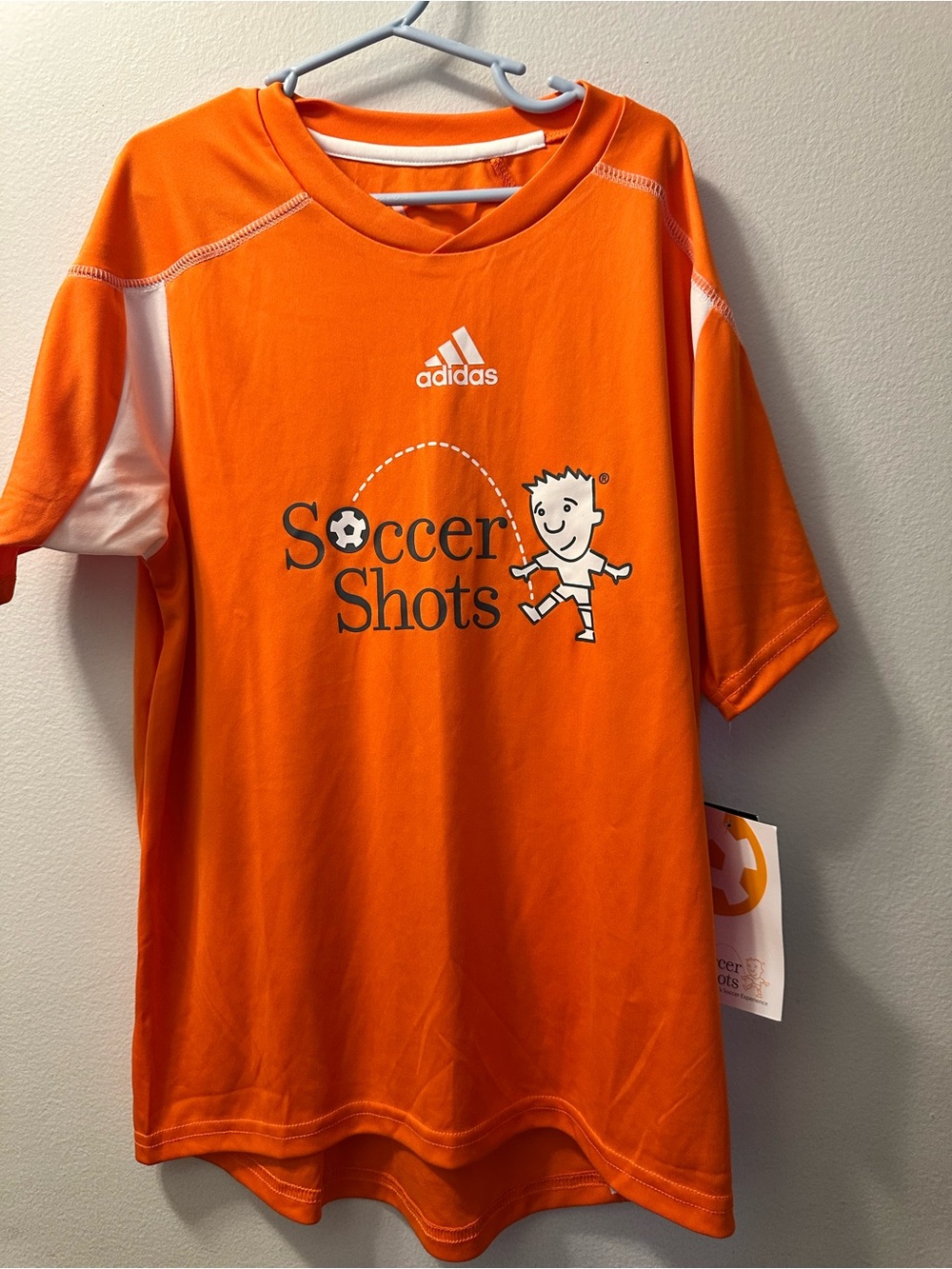 adidas Orange Kids Soccer Shots Short Sleeve Tee size large. 2 shirts!! MSRP $35